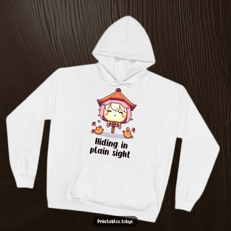 Funny hoodie featuring a secretive character peeking from behind a warmly glowing paper lantern, adding a touch of playful mystery.
