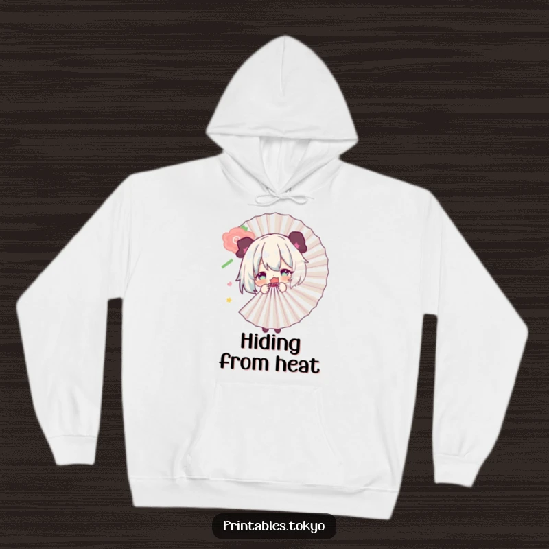Funny hoodie featuring a character playfully hiding behind a large fan, perfect for cozy moments and a touch of playful mystery.