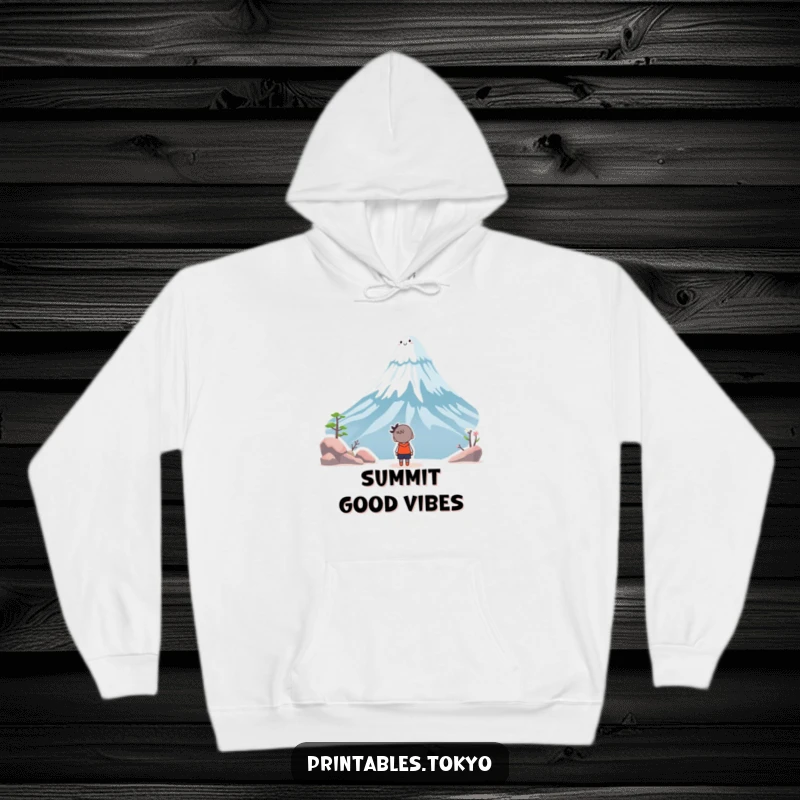 Funny hoodie with a character looking up in awe at a whimsical, smiling Mount Fuji, offering warmth and humor.