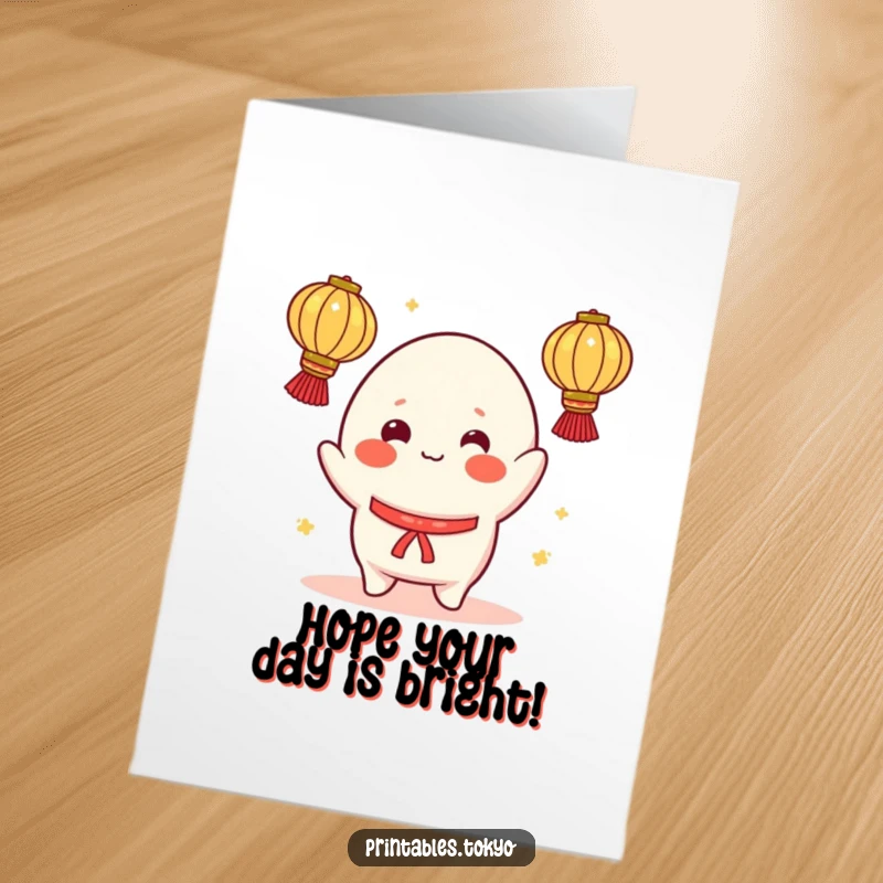 Funny Free Printable Birthday Card: A cheerful mochi character with rosy cheeks attempts to juggle multiple glowing lanterns.