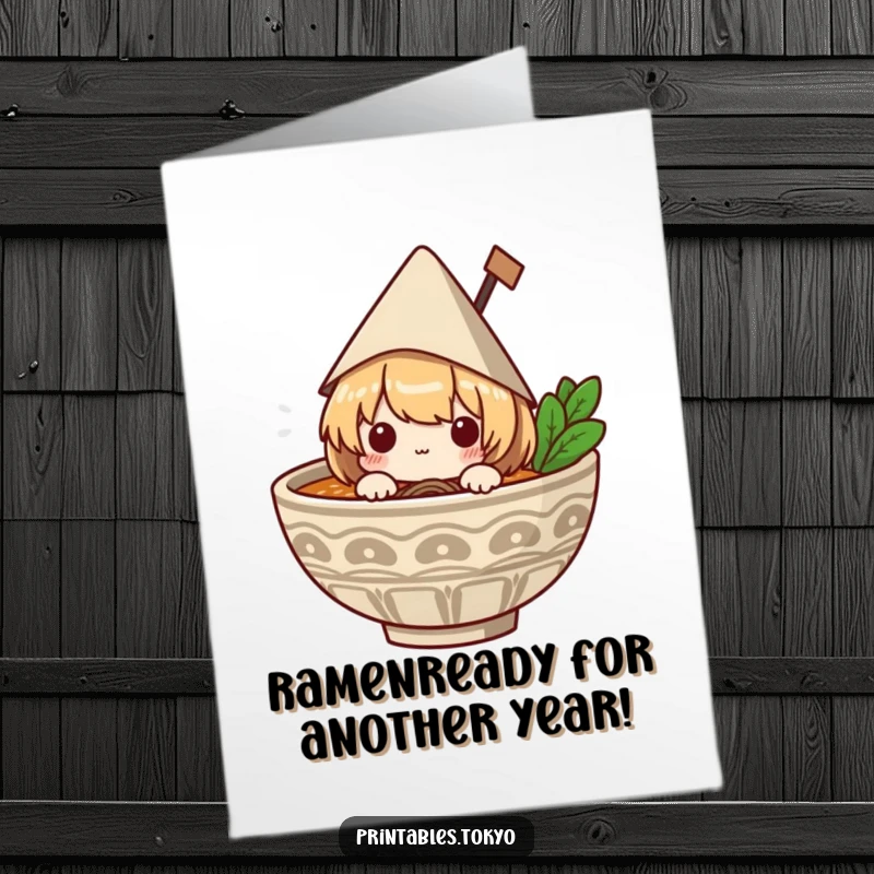 Funny free printable birthday card: A cute character in a tiny paper hat peeks out of a steaming ramen bowl, ready to party.