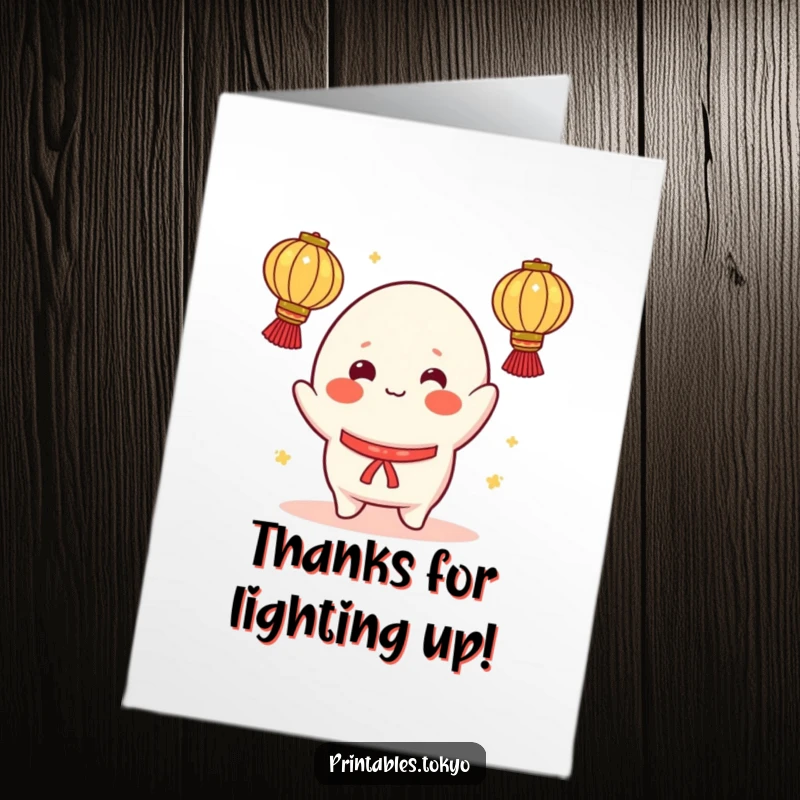 Funny Free Printable Thank You Card: A cheerful mochi character with rosy cheeks juggles glowing lanterns, bringing light.